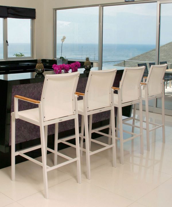 Barlow Tyrie Aura Counter Chairs Shown Indoors.