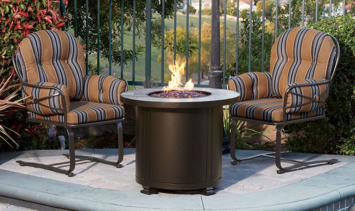 OW Lee Casual Fireside 30 Round Santorini Chat Fire Pit Shown with Spring Base Chairs