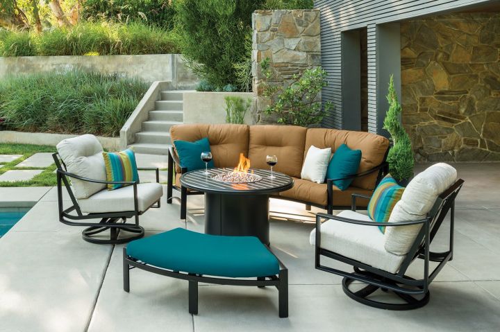 Tropitone Kenzo Cushion Cresent Sofa, Cresent, Pair of Swivel Action Lounge Chairs, and Cresent Ottoman Shown with Banchetto 42 Round Fire Pit